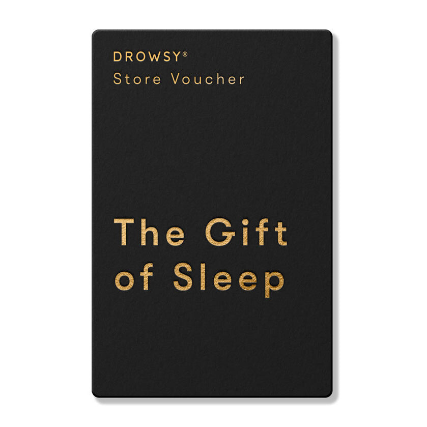 A black card with gold text reading drowsysleepco Sleep Gift Card at the top and The Gift of Sleep in the center—the perfect present from our online store.