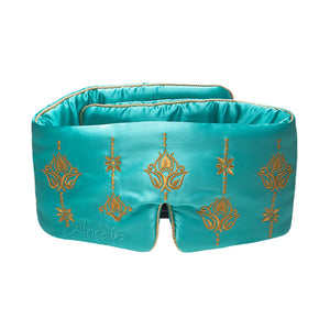 The drowsysleepco Jasmine Sleep Mask is a teal satin silk mask with gold embroidered patterns and “Aladdin” stitched on the lower left. This padded blackout mask has a nose notch for added comfort, ideal for beauty sleep.
