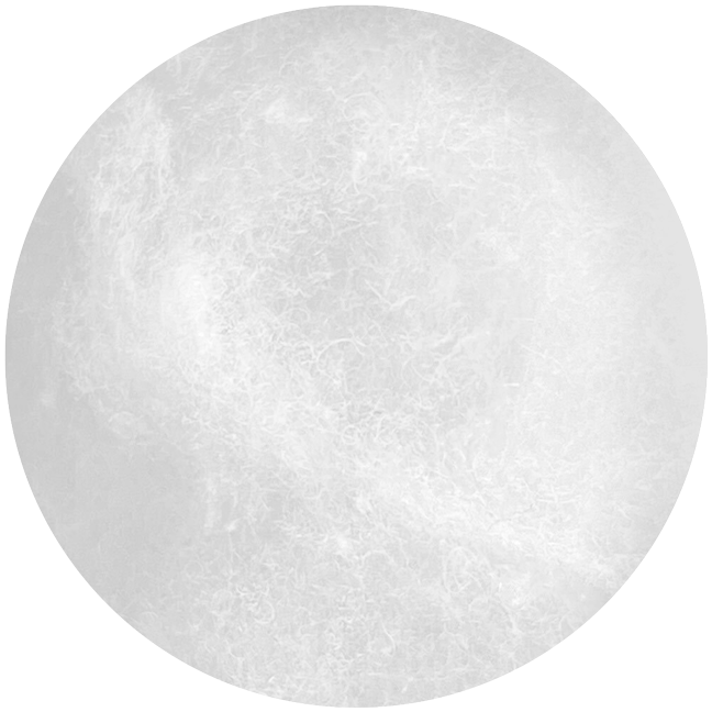 A close-up view of soft, white fibers forming a circular, fluffy, cloud-like texture on a light gray background.