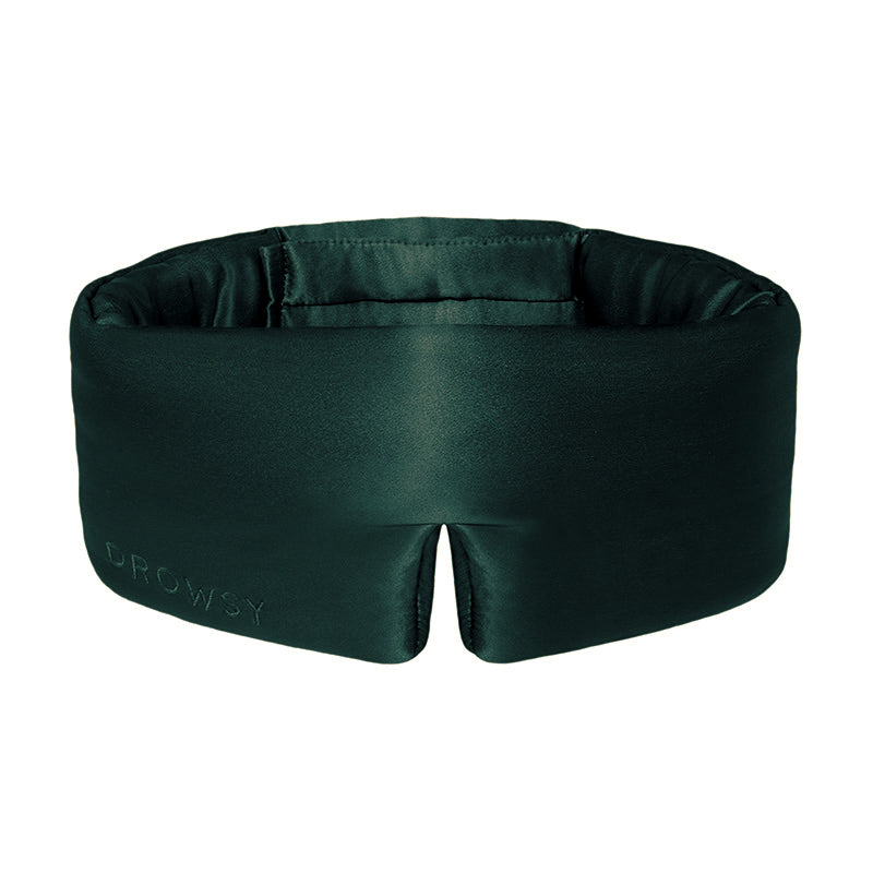 Introducing Ivy Green by drowsysleepco—a dark green padded sleep mask crafted from luxurious mulberry silk, featuring “DROWSY” embossed on one side. Designed to fully wrap around your head, it offers exceptional comfort and total light blocking.