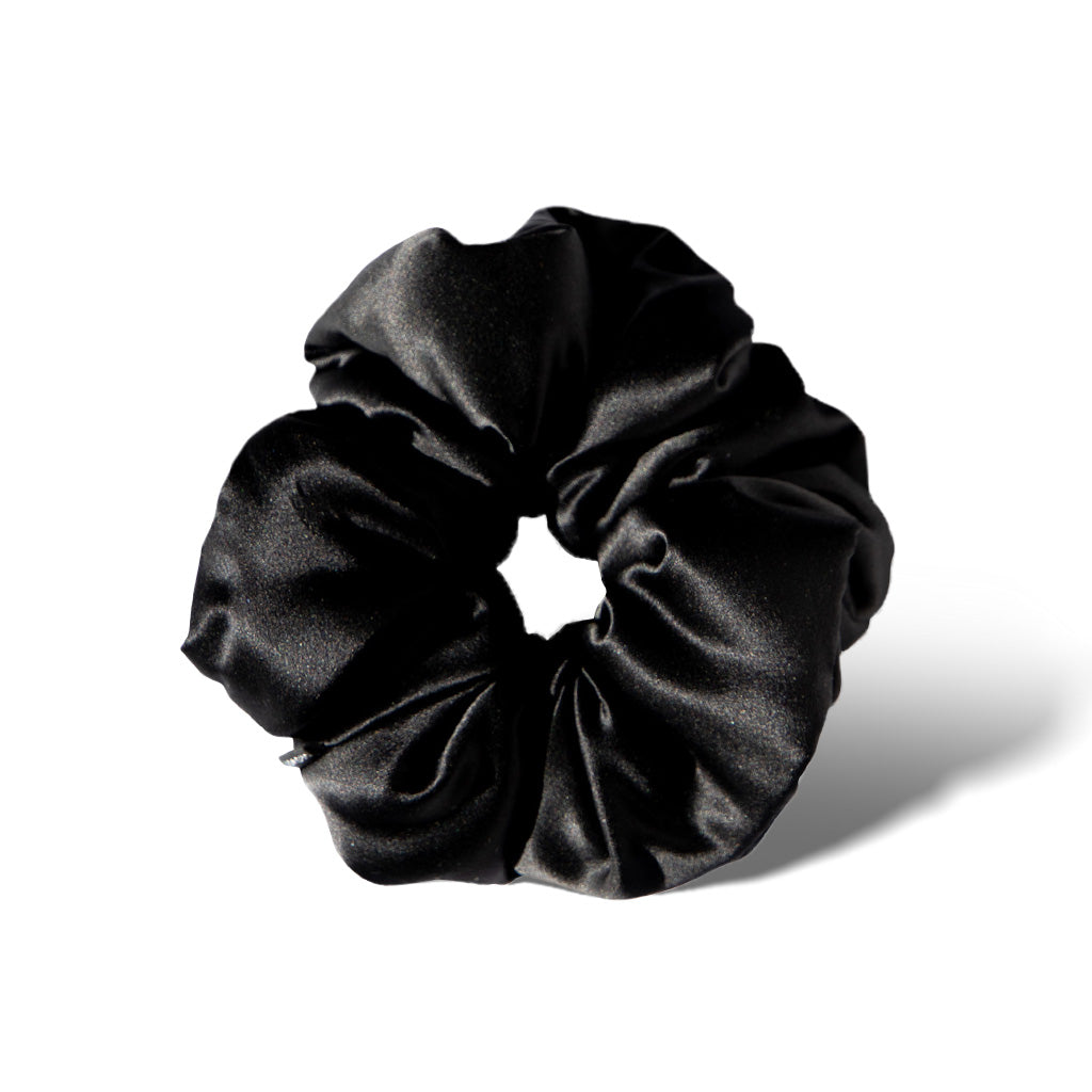 The Black Jade - Padded Scrunchie by drowsysleepco is an oversized black satin accessory, pictured on a white background with a soft shadow—designed to protect hair and elevate your style.