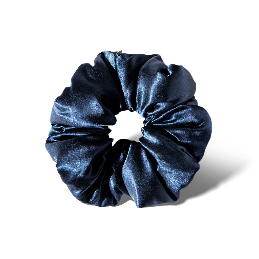 The drowsysleepco Midnight Blue Padded Scrunchie, oversized with a glossy, ruffled silk texture, is shown against a white background with a soft shadow.