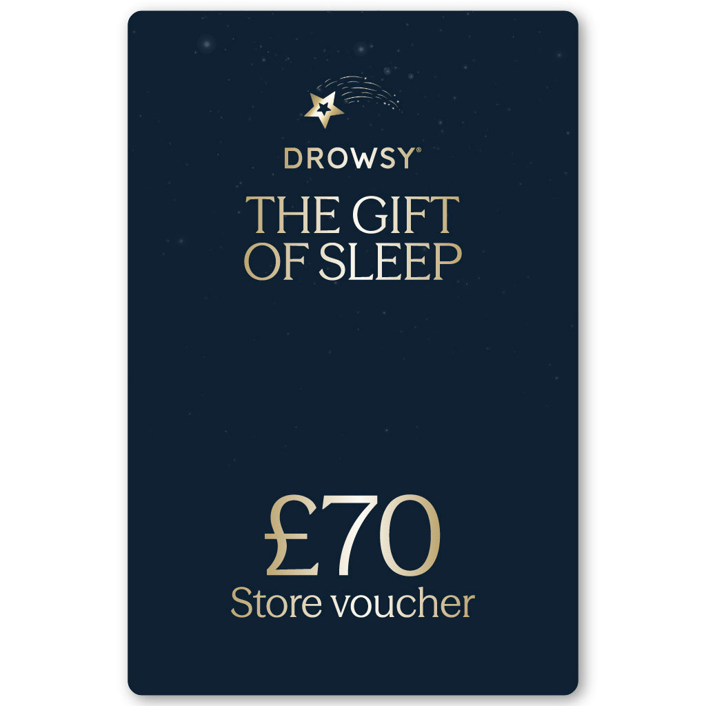A dark blue drowsysleepco Sleep Gift Card with gold text “Drowsy - The Gift of Sleep” and a £70 store voucher shown beneath a shooting star logo.