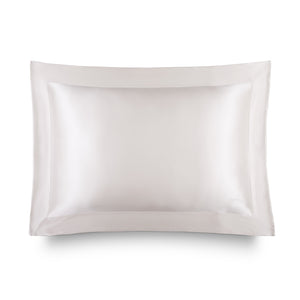 The Hyalo Pillowcase - Akoya Pearl by us.drowsysleepco features a smooth, lustrous white silk finish and a wide stitched border, shown against a plain white background. It offers overnight hydration to help keep your skin looking fresh and radiant.