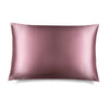 The Damask Rose Silk Pillowcase by drowsysleepco is a rectangular, mauve-colored pillowcase with a subtle sheen. 