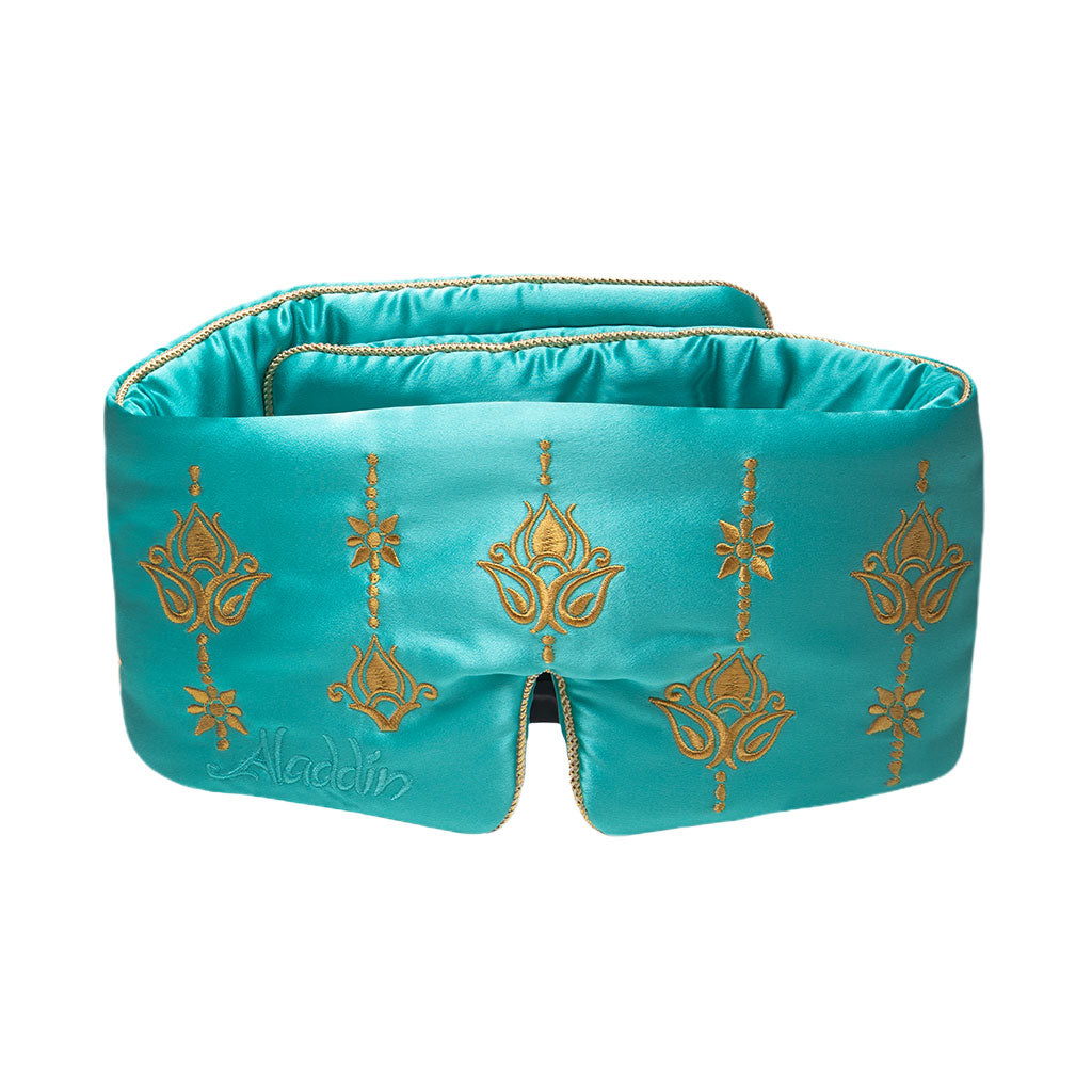 The drowsysleepco Jasmine Sleep Mask is a teal satin silk mask with gold embroidered patterns and “Aladdin” stitched on the lower left. This padded blackout mask has a nose notch for added comfort, ideal for beauty sleep.