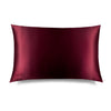 The La Vie En Rouge Silk Pillowcase by drowsysleepco, in deep burgundy with a smooth, shiny finish, is shown on a white background—a beauty and skincare must-have that protects hair.