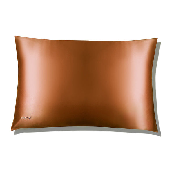 Terracotta coloured Drowsy silk pillowcase on white background