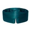 Model sleeping with green Drowsy silk sleep mask covering her eyes