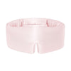 The Petal Pink sleep mask by us.drowsysleepco is a light pink, padded silk eye mask with a wide seamless band and “DROWSY” embroidery. This plush blackout mask fully covers your eyes for uninterrupted beauty sleep.