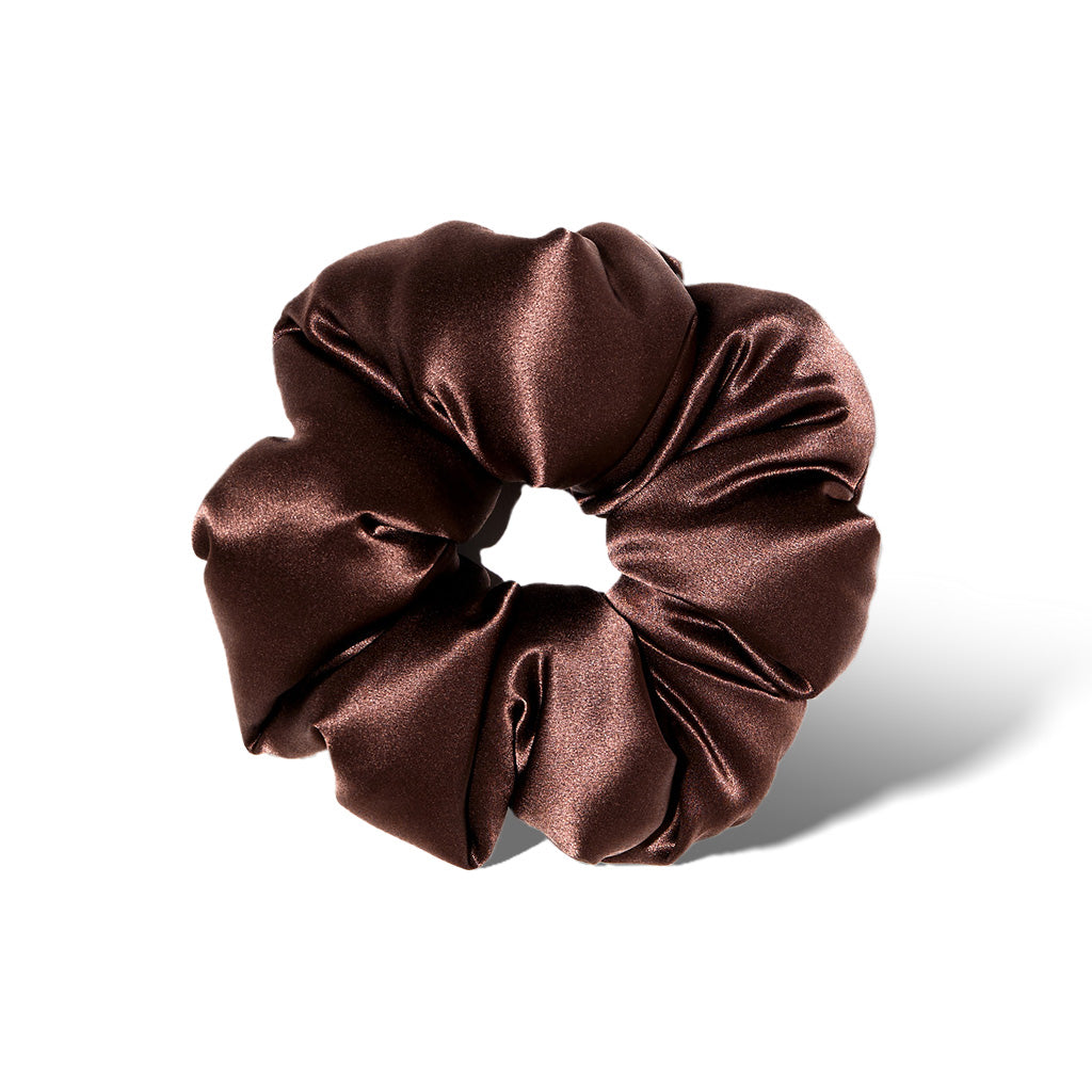 The drowsysleepco Cocoa Glow - Padded Scrunchie, in shiny dark brown silk, is shown on a plain white background. Its gathered, voluminous design is gentle on hair and promotes hair health.