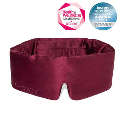 Drowsy Sleep Co. Red Silk Sleep Mask on white background with beauty awards